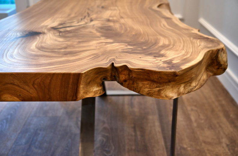 A long table made from wood slab.