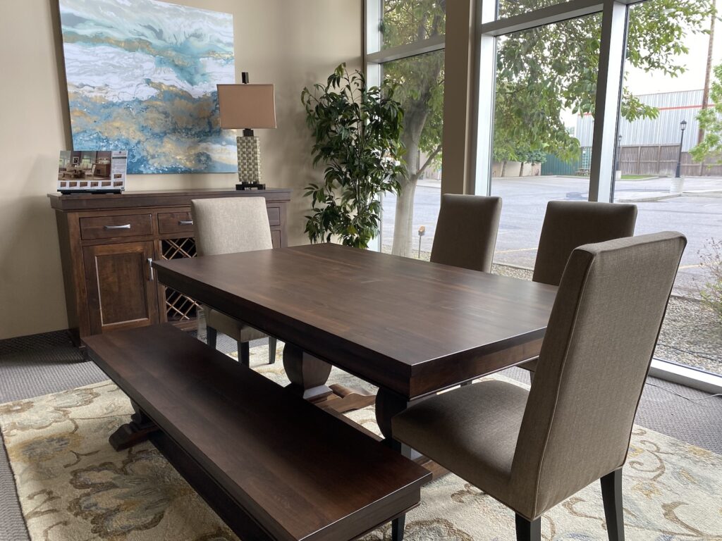 A hardwood furniture dining room display at Birchwood Furniture in Calgary.